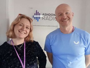 Man and Women smiling.