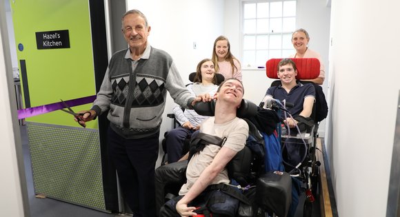 Group of People opening Hazels accessible Kitchen Space.