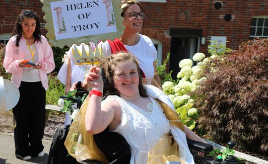 Girl dressed up as a Greek goddess.