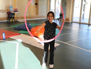 Young girl hoola hooping