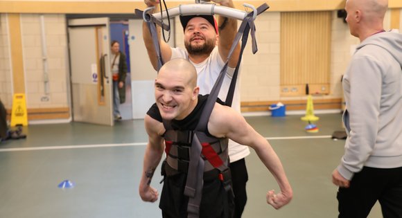 Man in standing sling.