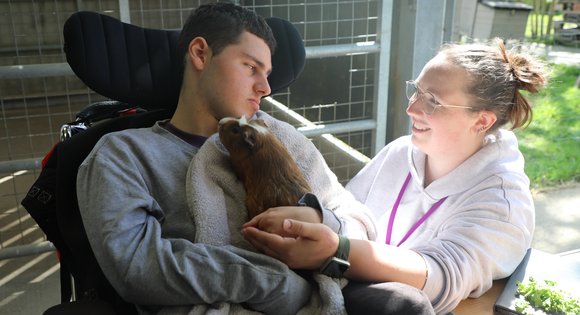 Sam and guinea pig in Farm
