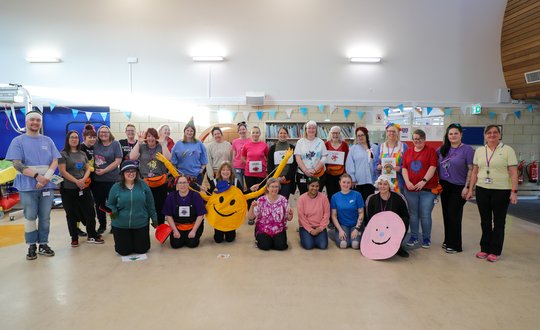 Big group of colleagues all dressed up.