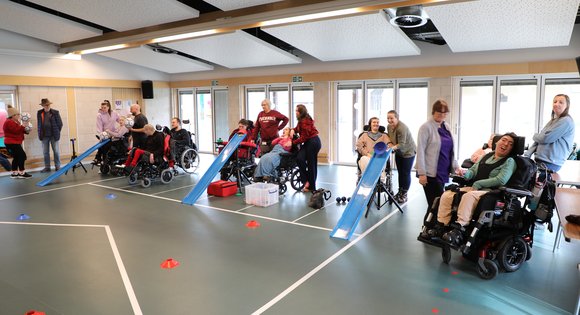 Group of people playing adaptive games.