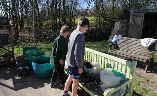 Boys picking out materials.