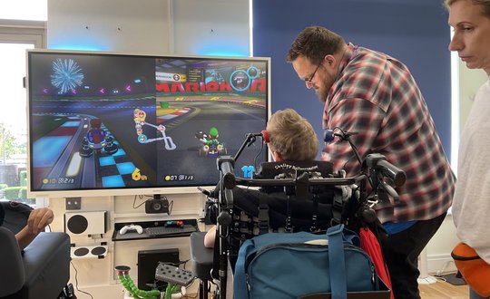 Enjoying a game by using assistive technology