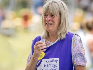 Women volunteering with a Chailey bib.