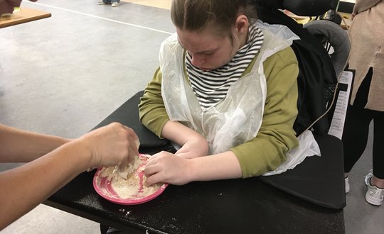 Girl playing with textures.