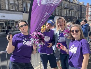 Women fundraising at Brighton Marathon.