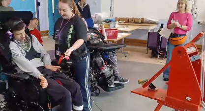 Catapult being used by a young person.