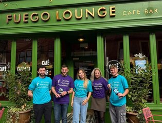 Group of supporters wearing CHF branded t-shirts.