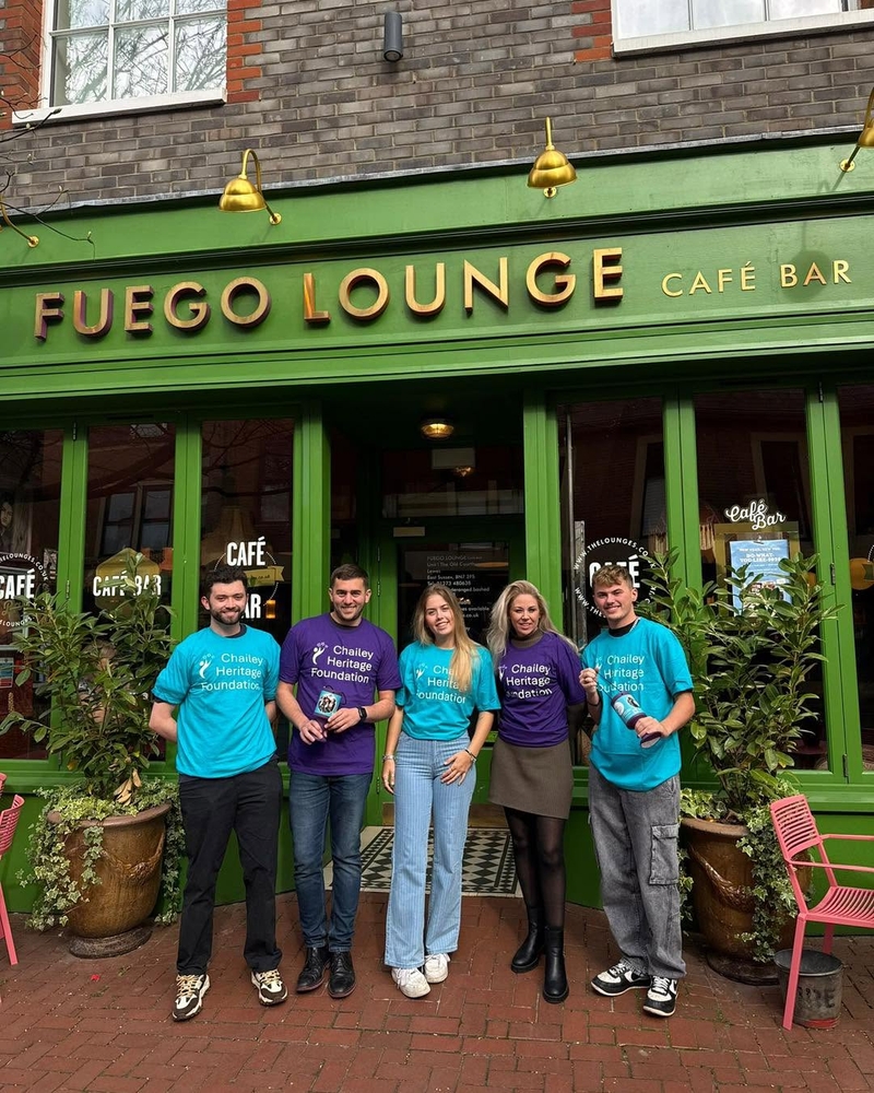 Group of supporters wearing CHF branded t-shirts.