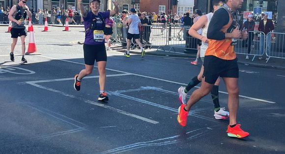 Girl running the Brighton marathon.